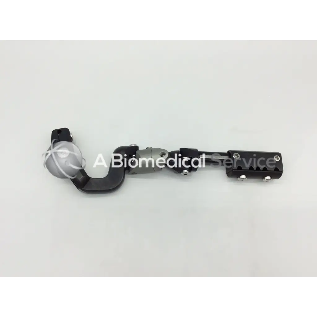 Black and silver articulated orthopedic joint prosthesis with spherical end in ebi 01350 external clamp ac5-359