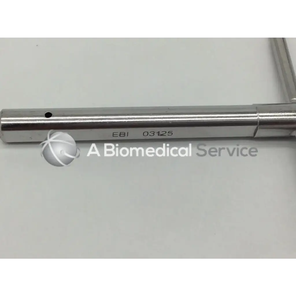 Silver metallic ebi 03125 t-wrench for bone screw with engraved markings and small black dot near one end