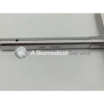 Silver metallic ebi 03125 t-wrench for bone screw with engraved markings and small black dot near one end