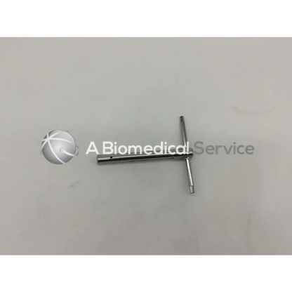 Silver t-wrench surgical instrument with cylindrical handle for bone screw ad5-147 and screw ad5-147 121322sm use