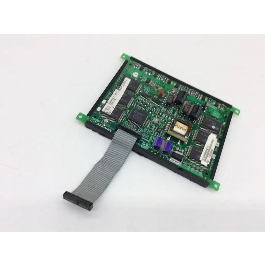 Green printed circuit board with black integrated circuits and gray ribbon cable attached on display planar el320.240.36 bbcc1-8
