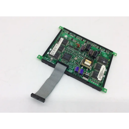 Green printed circuit board with black integrated circuits and gray ribbon cable attached on display planar el320.240.36 bbcc1-8
