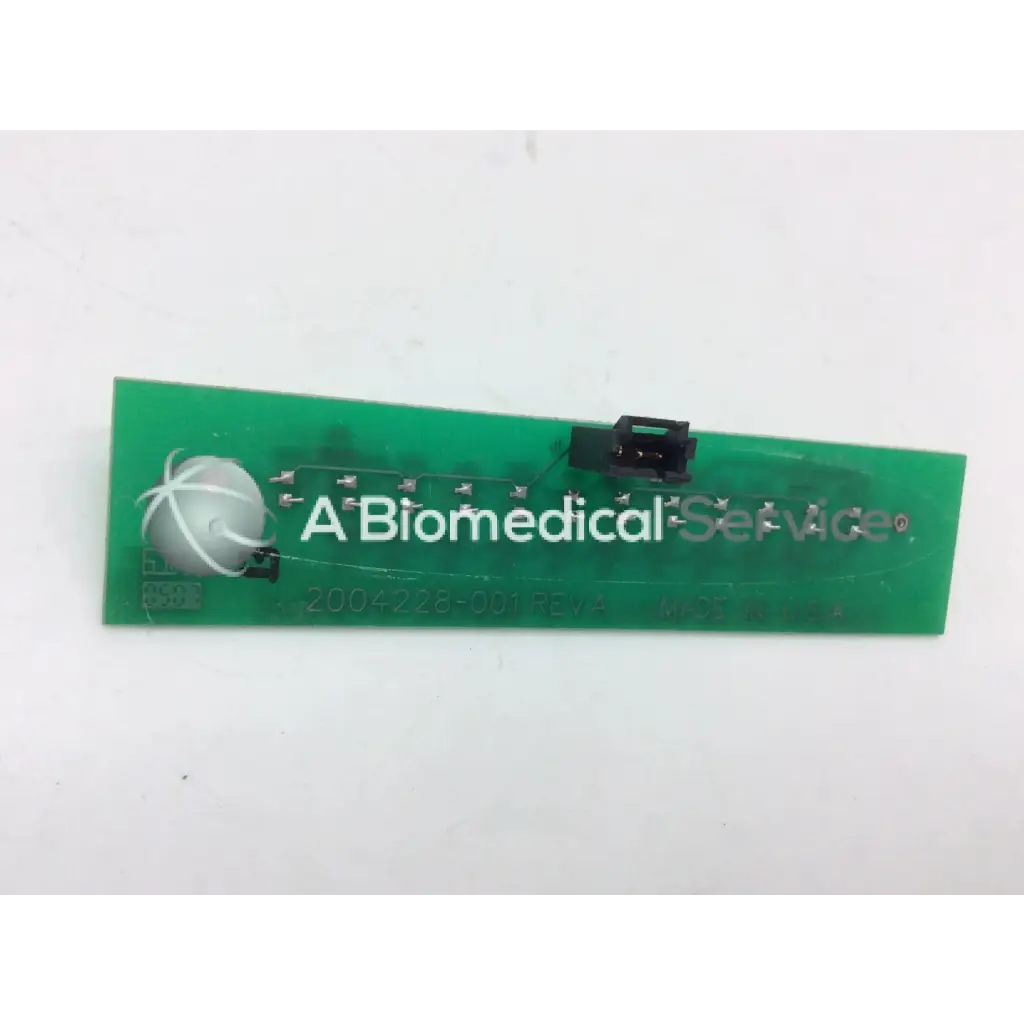 Green rectangular circuit board with black connectors and white logo for GE Marquette Dash 4000 alarm light assembly