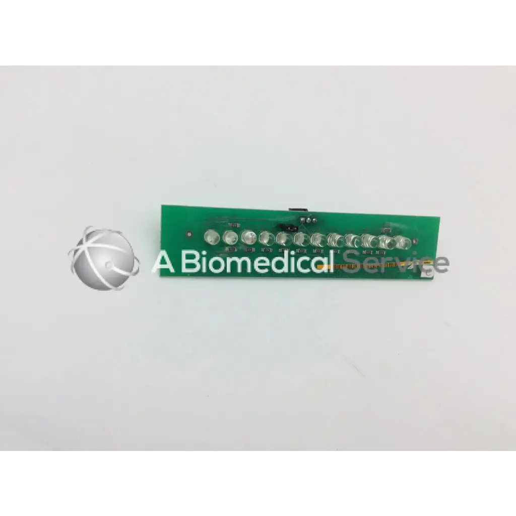 Green rectangular circuit board with ten silver led lights in marquette dash 4000 alarm light assembly