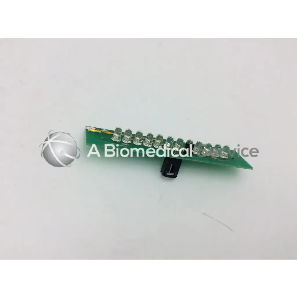 Green circuit board with clear led lights and black component for ge marquette dash 4000 alarm light assembly