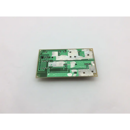 Green rectangular printed circuit board with black components and white adhesive patches for ge medical supply unit 226589d power supply unit