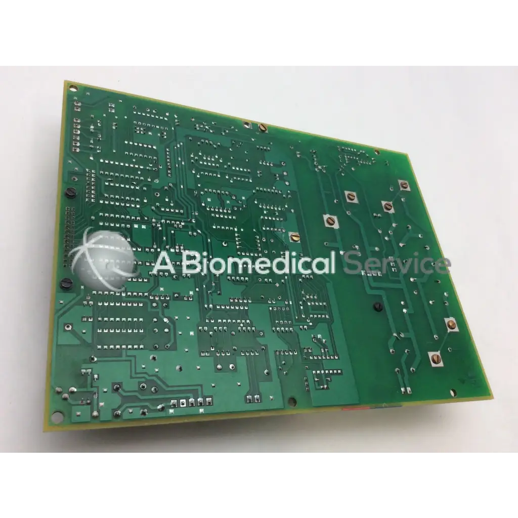 Green rectangular printed circuit board with intricate copper traces and soldered components for plus fil kvp control board