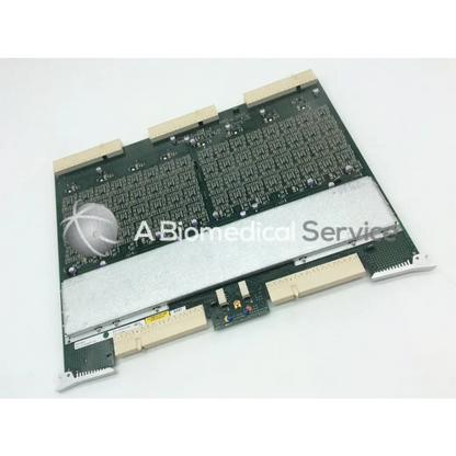 Green circuit board with silver metallic heat sink and beige connectors in GE vivid 9 dimension ultrasound fc200057-05 rev board