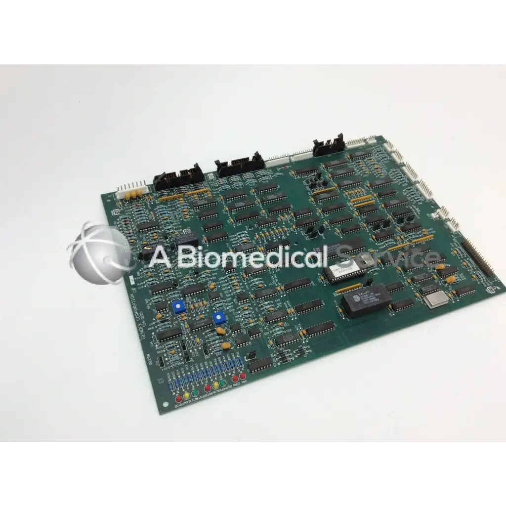 Green circuit board with black integrated circuits and silver spherical logo for gendex 9000 xray x-ray circuit board 124-0229