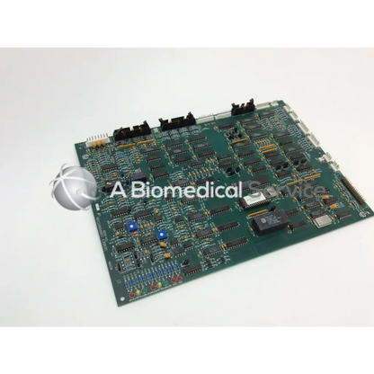Green circuit board with black integrated circuits and silver spherical logo for gendex 9000 xray x-ray circuit board 124-0229
