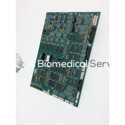 Green printed circuit board with black integrated circuits and blue capacitors for gendex 9000 xray x-ray circuit board 124-0229