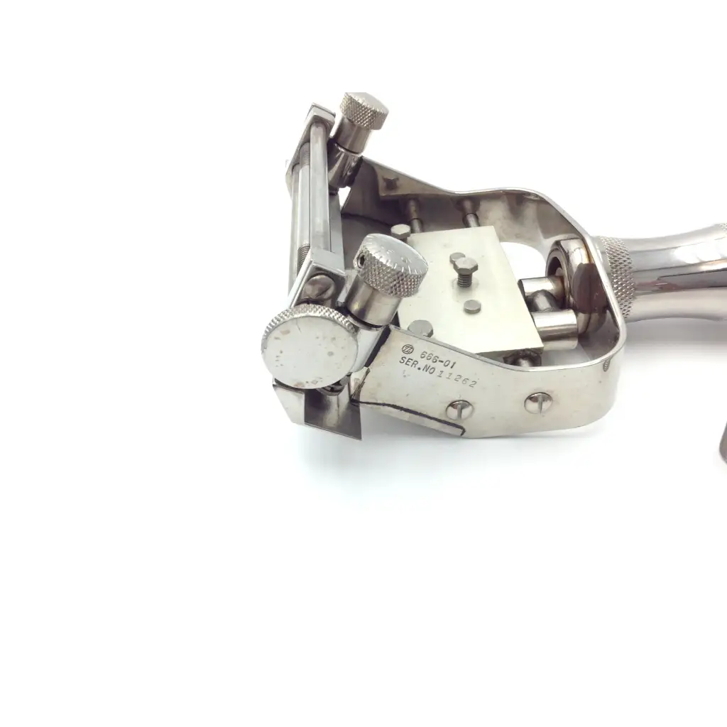 Stainless steel dental handpiece with adjustable knobs and serial number for genesis case sterilization container use