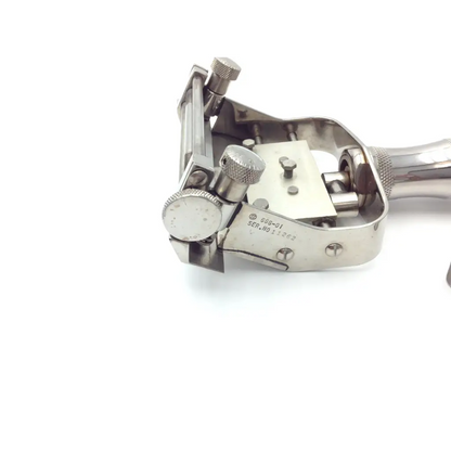 Stainless steel dental handpiece with adjustable knobs and serial number for genesis case sterilization container use