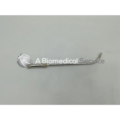 Silver-colored Greenwald U501-24 urethral guide 24fr with spherical head engraved cross pattern and curved metallic shaft