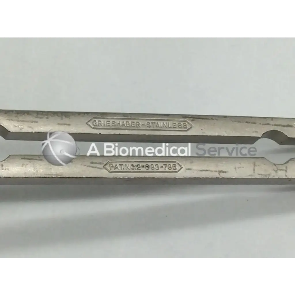 Stainless steel grieshaber surgical forceps with engraved branding and patent number for balfour abdominal retractor use