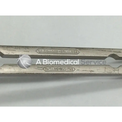 Stainless steel grieshaber surgical forceps with engraved branding and patent number for balfour abdominal retractor use