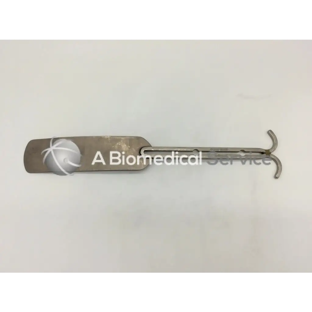 Silver metallic balfour abdominal retractor with flat rounded handle and curved end surgical medical instrument