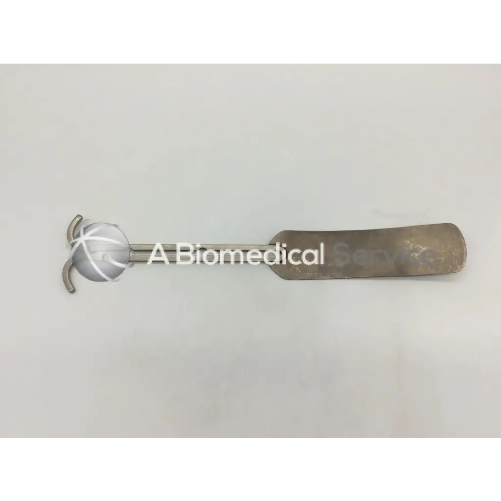 Silver balfour abdominal retractor medical instrument with rounded textured head and flat rectangular handle