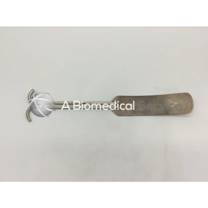 Silver balfour abdominal retractor medical instrument with rounded textured head and flat rectangular handle