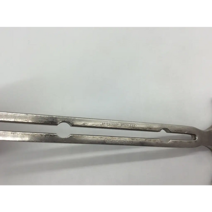 Silver stainless steel balfour abdominal retractor tongs with polished worn finish and engraved branding