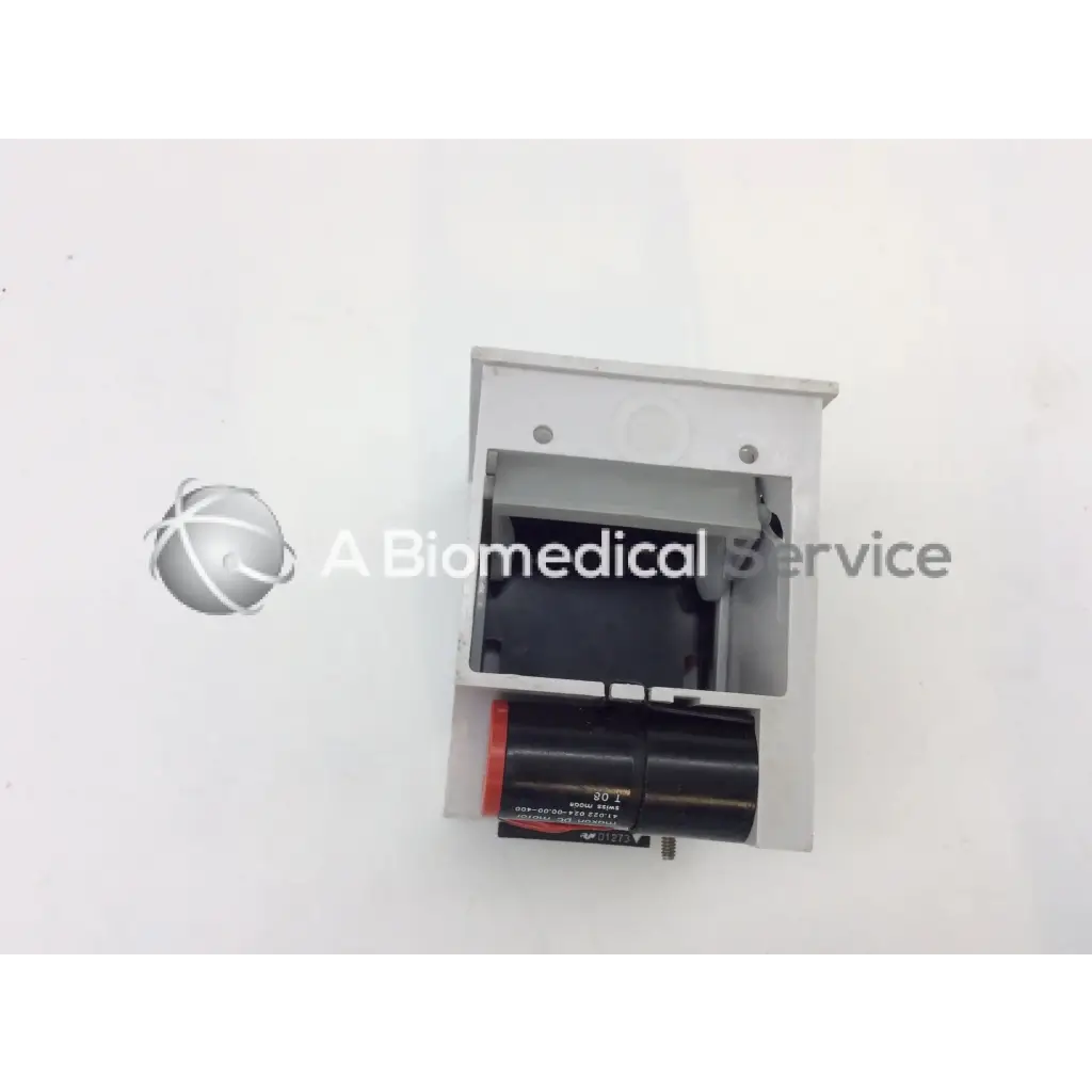 Gray metallic gsi lumonics hot dot recorder module housing with black cylindrical component and red accent detail