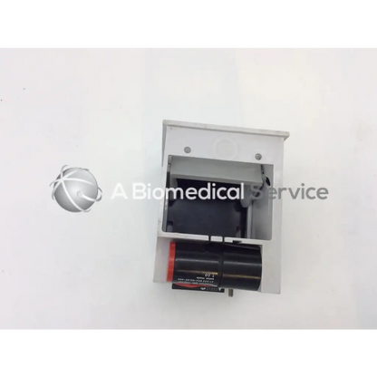 Gray metallic gsi lumonics hot dot recorder module housing with black cylindrical component and red accent detail