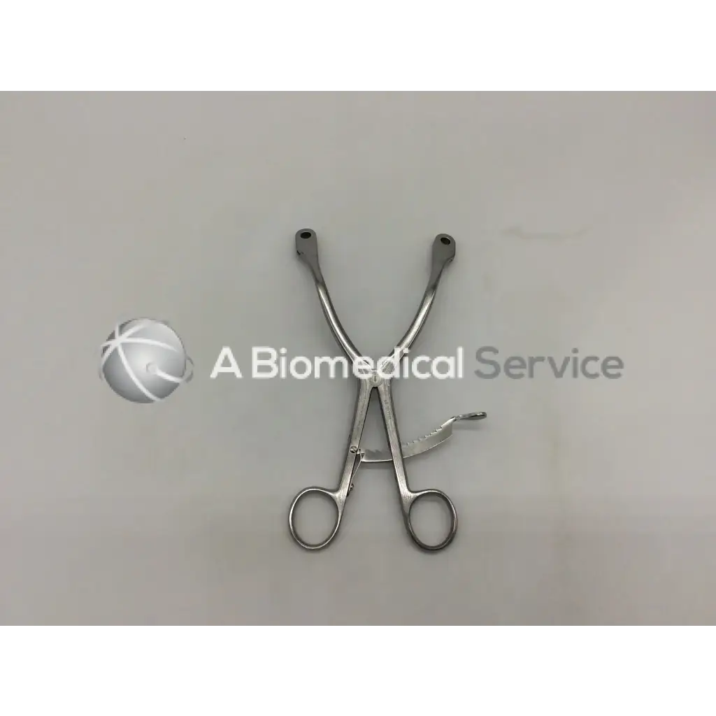 Silver kolbel restractor ring handle surgical instrument with two curved handles and textured grip by gsource