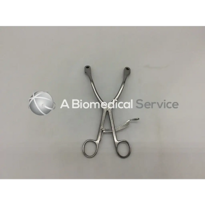 Silver kolbel restractor ring handle surgical instrument with two curved handles and textured grip by gsource