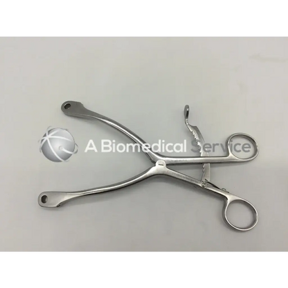 Gsource 40.7510 kolbel restractor ring handle with silver surgical clamp curved serrated jaw and ergonomic handles