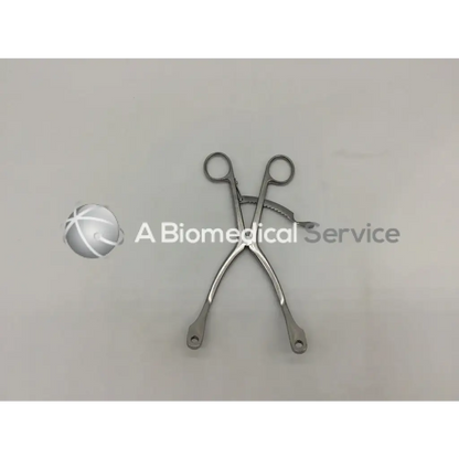 Stainless steel kolbel retractor ring handle with curved serrated jaws for precise surgical use by gsource 40.7510