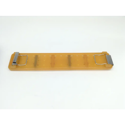 Orange translucent plastic belt buckle with silver metal hardware and four vertical slots for gynecare 4mm 12° hysteroscope