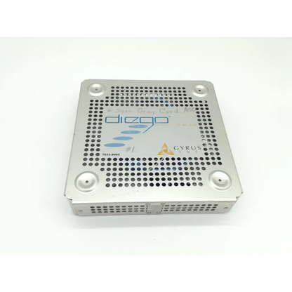 Silver perforated metal surgical instrument tray with diego and gyrus acmi branding for diego shaver handpiece storage