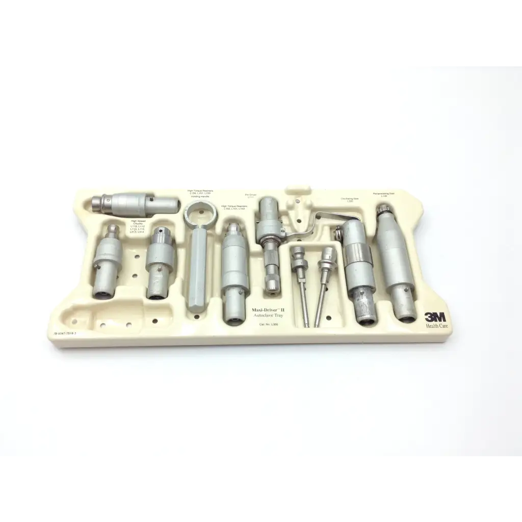 Silver metallic hall 3m maxi driver air surgical power set with labeled beige maxi-driver ii autoclave case tray