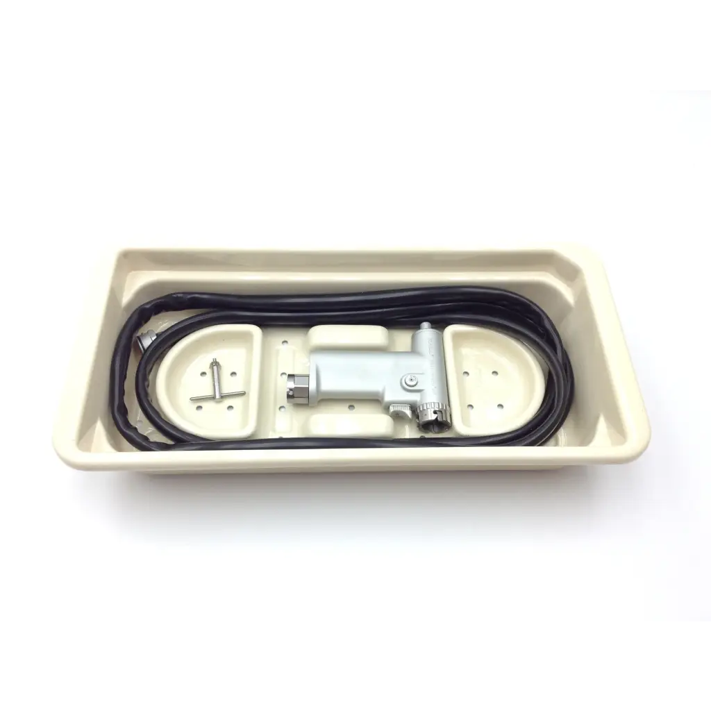 Silver dental handpiece with black coiled cord in beige tray for hall 3m maxi driver ii autoclave case power set