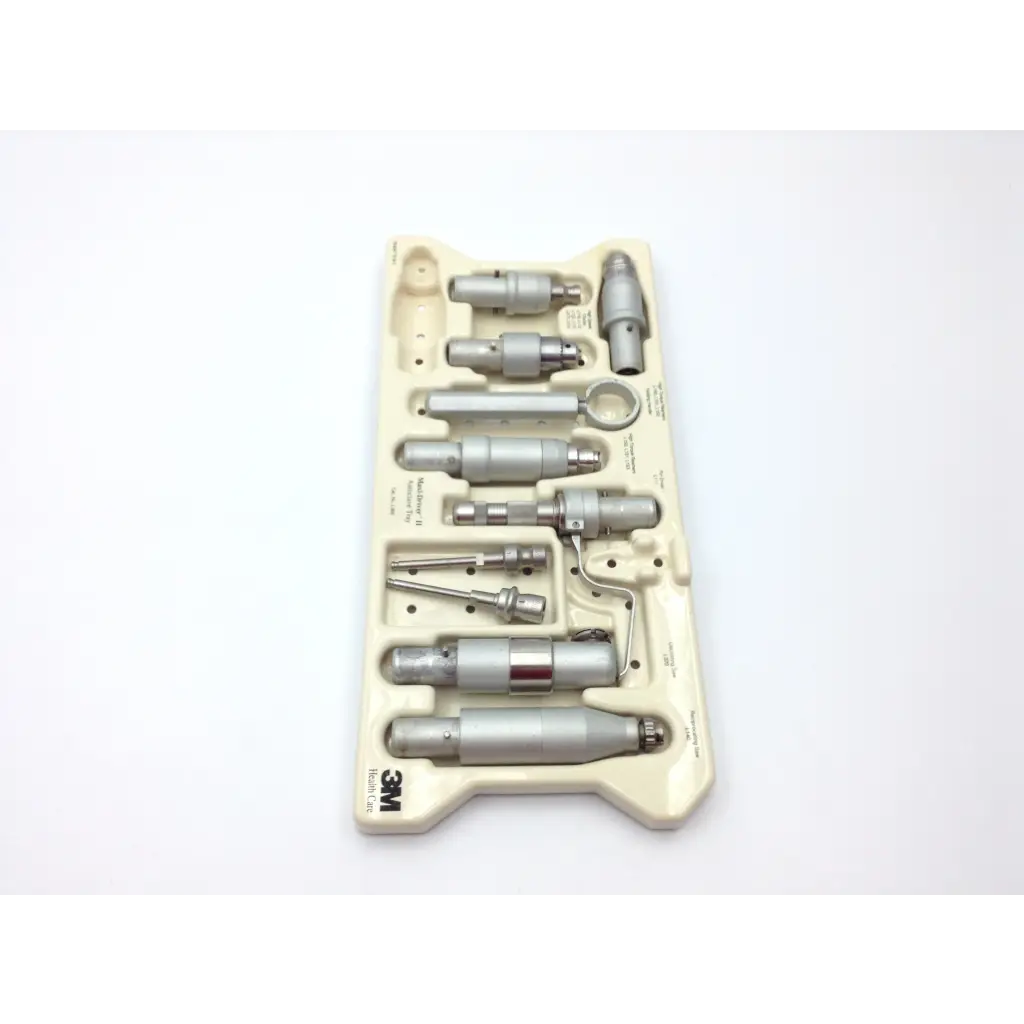 Silver metallic surgical instrument set in beige 3m branded tray for hall 3m maxi driver air surgical power set with maxi-driver ii autoclave case