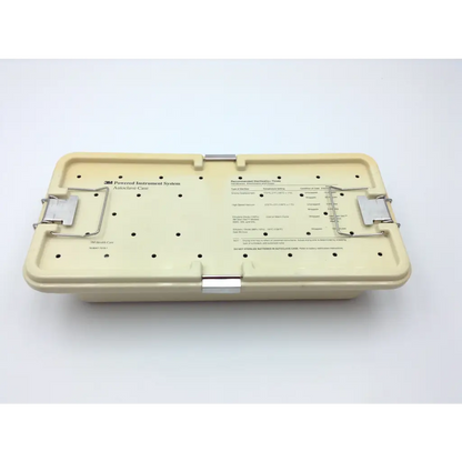 Beige 3m powered instrument autoclave case with metal clasps and printed labeling chart for maxi-driver ii autoclave