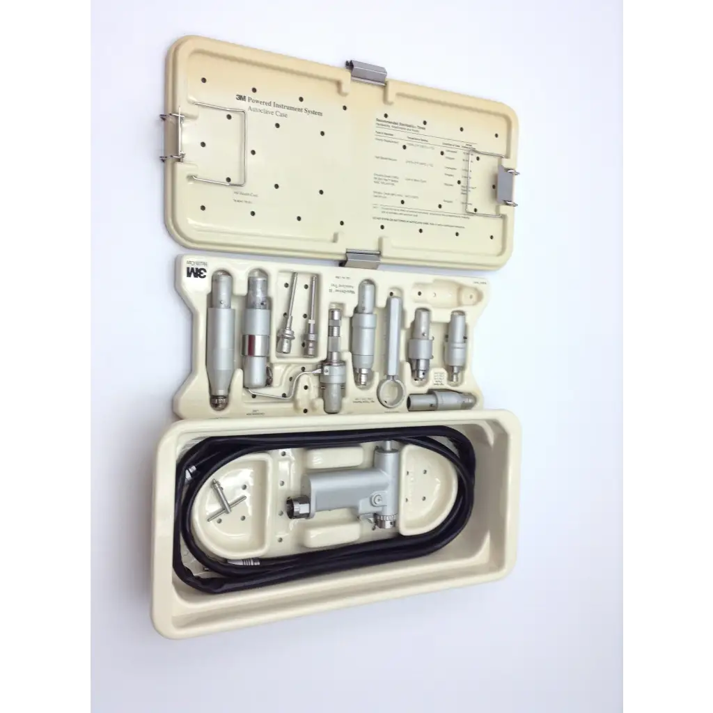 Hall 3m maxi driver air surgical power set with silver metallic tools and black hose in maxi-driver ii autoclave case