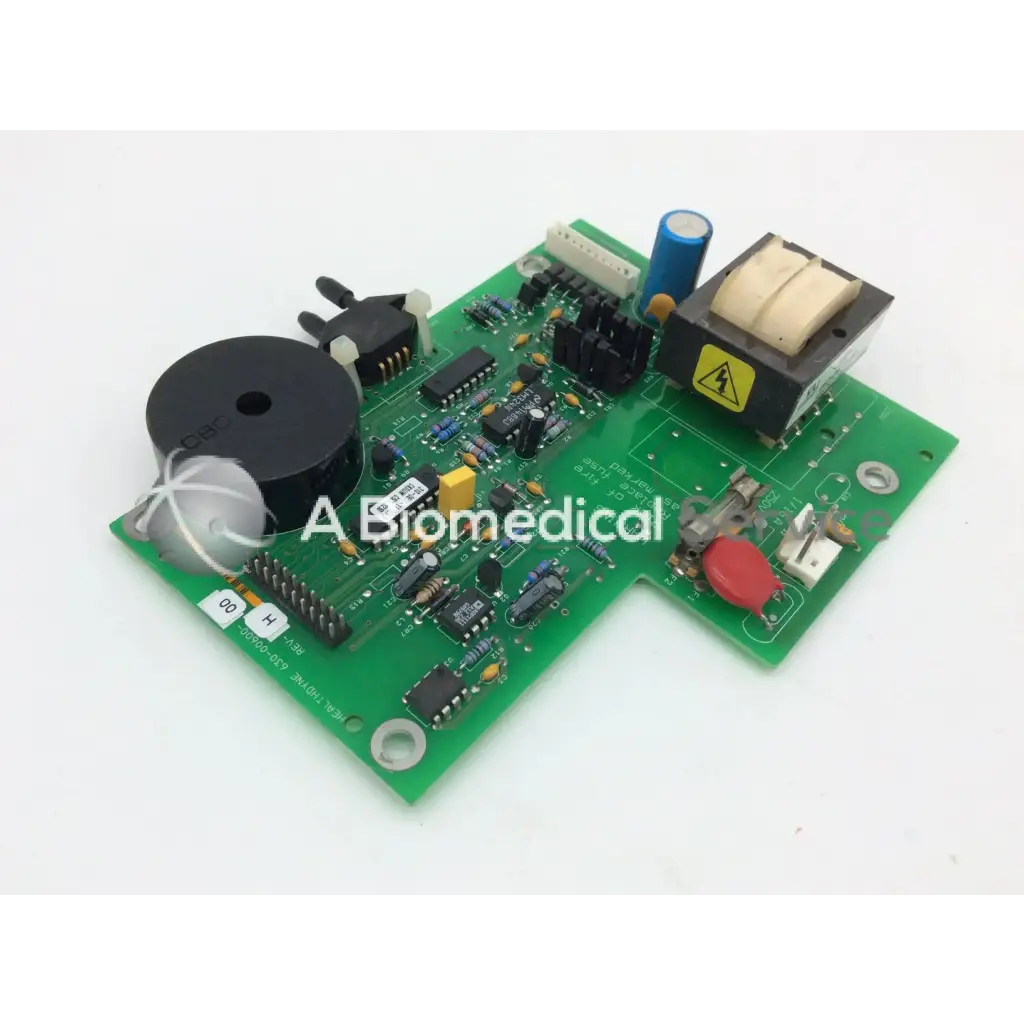 Green printed circuit board power supply parts with black speaker capacitors resistors and orange button for healthdyne 630-00600-00