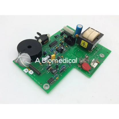 Green printed circuit board power supply parts with black speaker capacitors resistors and orange button for healthdyne 630-00600-00