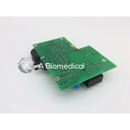 Green printed circuit board with black and blue components and silver sensor for healthdyne power supply parts model 630-00600-00