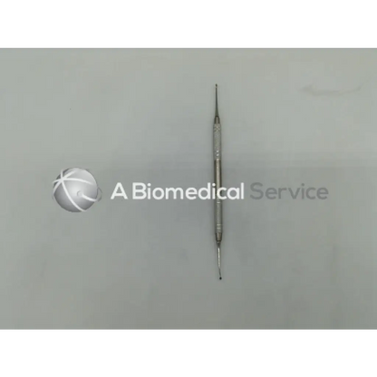 Silver dual-ended wax carver stainless with textured grip and fine tips for dental use by Henry Schein 100-7078