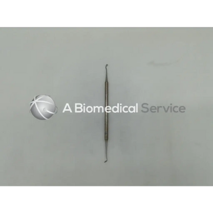 Stainless steel henry schein carver 5t double end dental instrument with textured handle and dual-ended tips