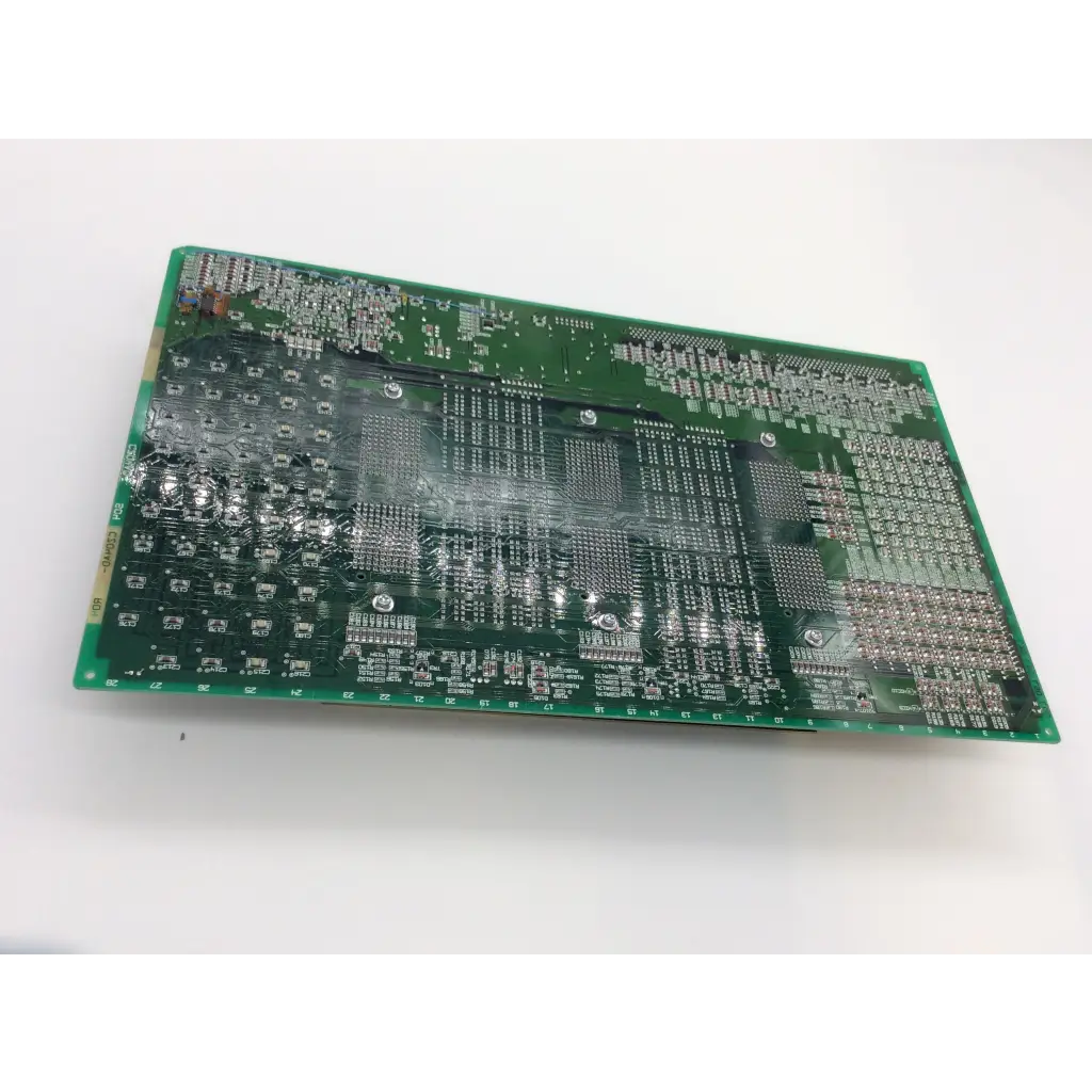Green rectangular hitachi cz04ad-s14 il67dv interface board assembly with integrated circuits and silver solder points