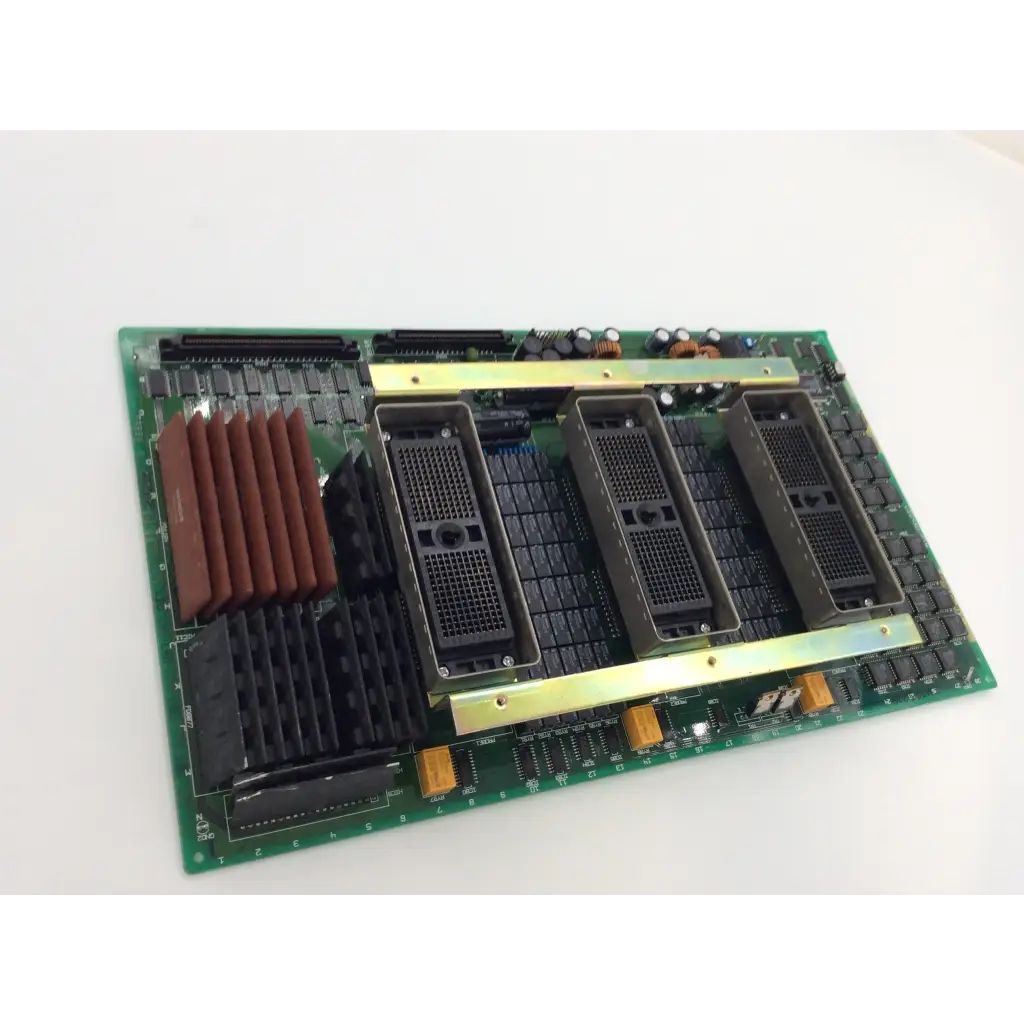 Green circuit board with black modular slots brown heat sinks and gold connectors for hitachi cz04ad-s14 il67dv interface