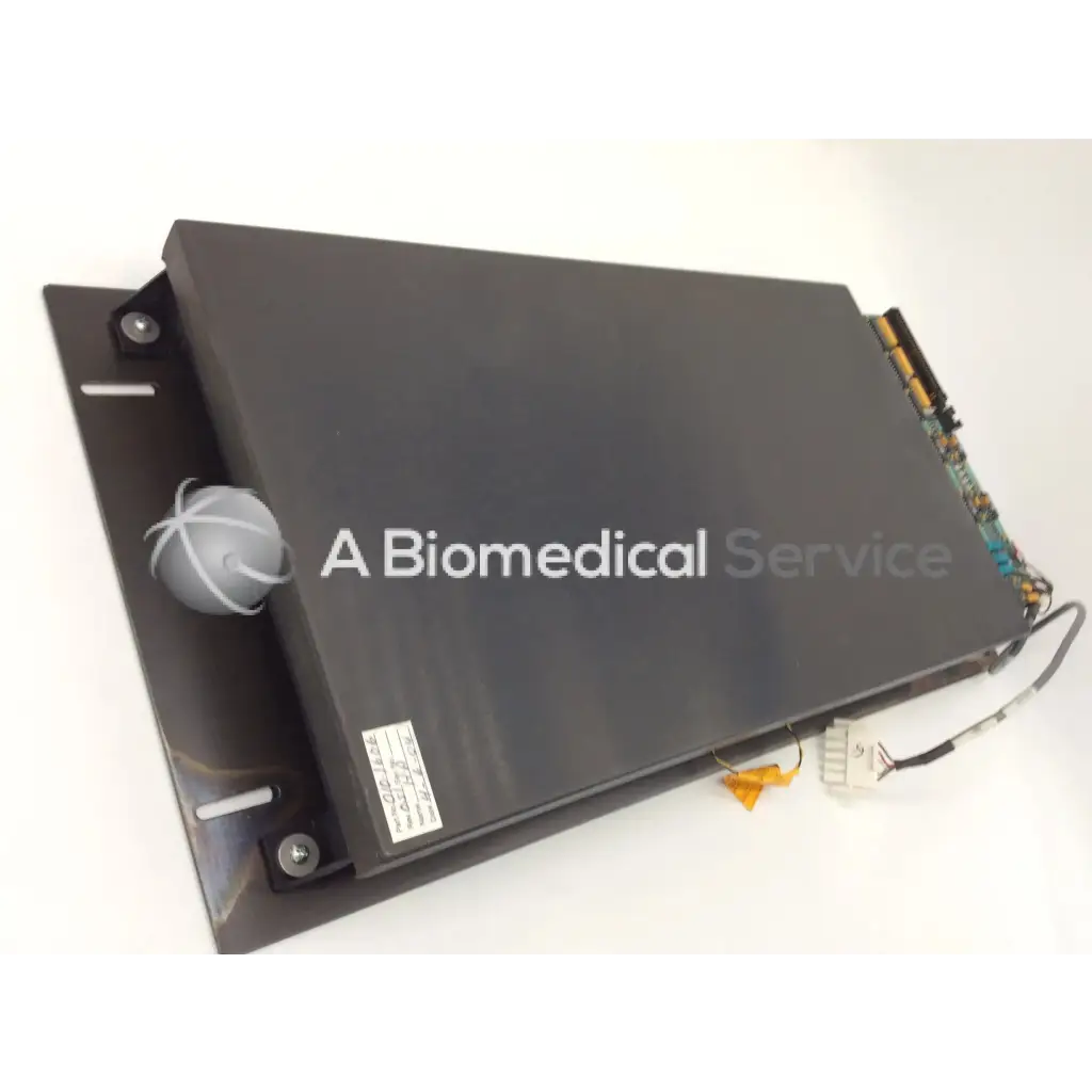 Black rectangular medical channel detector assembly with silver spherical component and visible circuitry on right edge