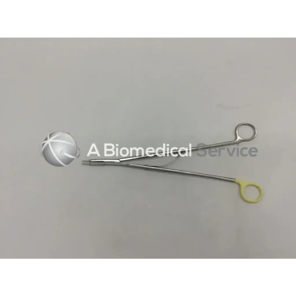 Silver surgical open ligating clip appliers small with yellow-handled loops for precise clip application