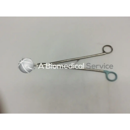 Silver medium curved open ligating clip appliers with spherical textured head and teal finger loops for orthopedic use