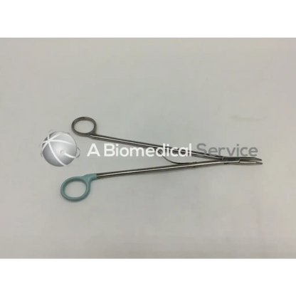 Silver medium curved open ligating clip appliers with teal handles for orthopedic use