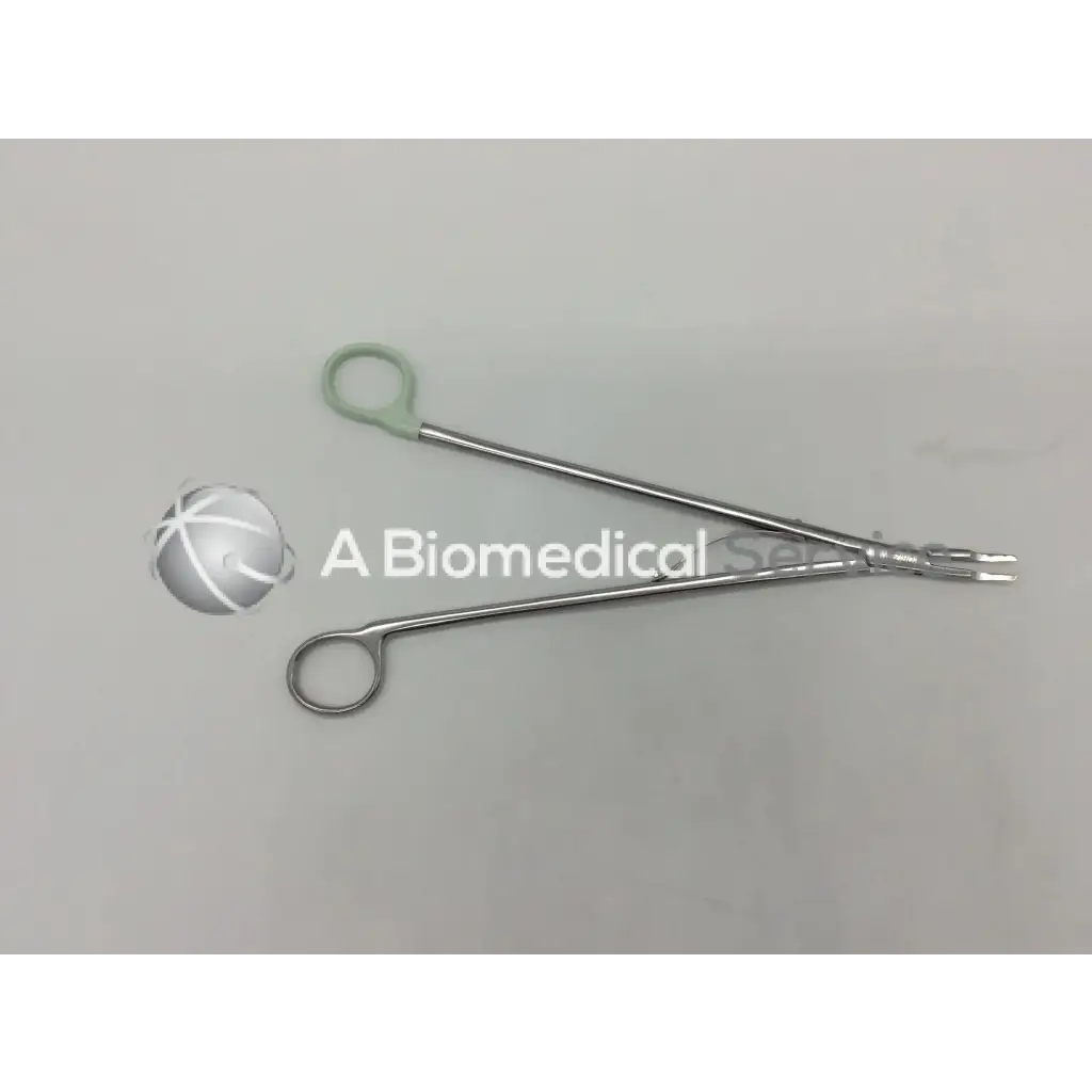 Silver open ligating clip appliers medium with light green ring handle and precision-tipped curved forceps