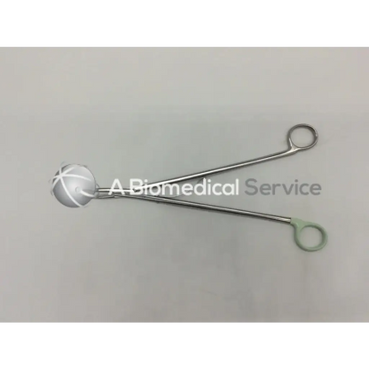 Silver open ligating clip appliers medium large curved with white spherical tips and green rubberized handles